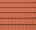 Corrugated clay or concrete tiles